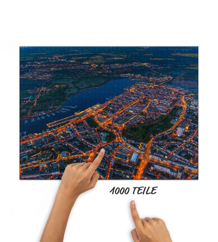 Puzzle Nachts über der Hansestadt Rostock