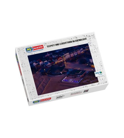 Puzzle Teepott und Leuchtturm im Abendlicht